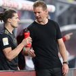 Bayern Munich head coah Julian Nagelsmann (R) speaks to Marcel Sabitzer, who made his club debut at Leipzig on Saturday