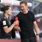 Bayern Munich head coah Julian Nagelsmann (R) speaks to Marcel Sabitzer, who made his club debut at Leipzig on Saturday