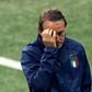 Roberto Mancini's stylish look was washed away by the Wembley rain