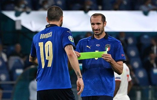 Giorgio Chiellini passed the Italian captain's armband to Leonardo Bonucci before going off against Switzerland.