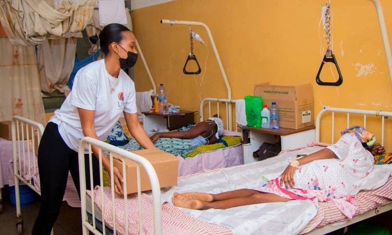 Stephanie Karikari celebrates with mothers at Winneba Municipal Hospital