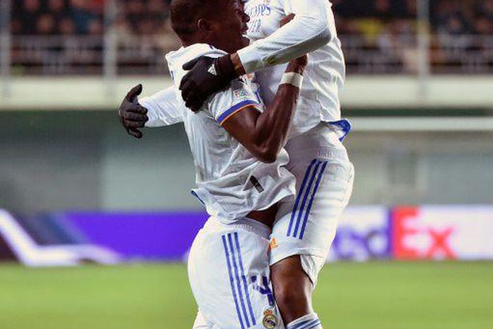 David Alaba celebrates with Eder Militao after scoring the opening goal