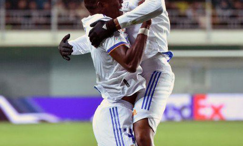 David Alaba celebrates with Eder Militao after scoring the opening goal