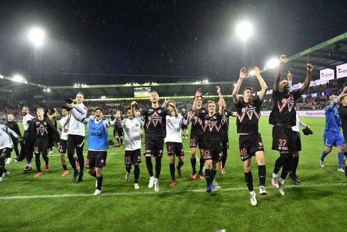 Danish delight: Midtjylland's players celebrate after defeating Celtic