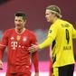 Bayern Munich striker Robert Lewandowski (L)and Dortmund forward Erling Haaland (R) are set to go head-to-head Saturday