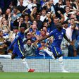 Chelsea striker Romelu Lukaku (R) celebrates scoring