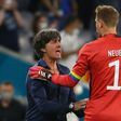 Germany head coach Joachim Loew celebrates with  goalkeeper Manuel Neuer after reaching the last 16 of Euro 2020 with a 2-2 draw against Hungary