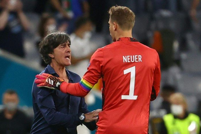 Germany head coach Joachim Loew celebrates with  goalkeeper Manuel Neuer after reaching the last 16 of Euro 2020 with a 2-2 draw against Hungary