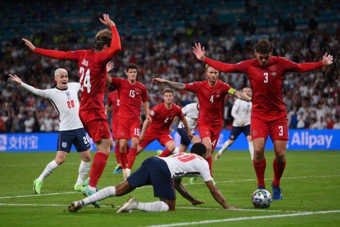 Raheem Sterling goes to ground for England's decisive penalty against Denmark