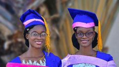 Adorable twins bag first-class degrees from the same university