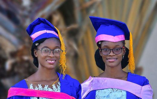 Adorable twins bag first-class degrees from the same university