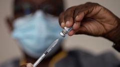 In this Wednesday, July 28, 2021 file photo, a health worker administers a dose of Janssen COVID-19 vaccine by Johnson & Johnson in the Medina neighborhood in Dakar, Senegal.