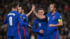 England striker Harry Kane (R) celebrates after scoring against Albania