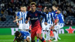 Antoine Griezmann got the opener as Atletico Madrid beat Porto to qualify for the Champions League last 16
