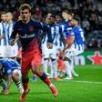 Antoine Griezmann got the opener as Atletico Madrid beat Porto to qualify for the Champions League last 16