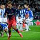 Antoine Griezmann got the opener as Atletico Madrid beat Porto to qualify for the Champions League last 16