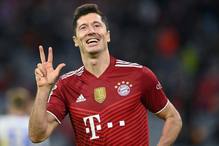 Robert Lewandowski celebrates his hat-trick as Bayern Munich thrashed Hertha Berlin 5-0 on Saturday