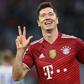 Robert Lewandowski celebrates his hat-trick as Bayern Munich thrashed Hertha Berlin 5-0 on Saturday