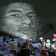 Messages of support adorn a mural of Manchester United and England forward Marcus Rashford after it was defaced