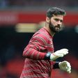 Liverpool's Brazilian goalkeeper Alisson Becker is one of the South American players cleared to play this weekend
