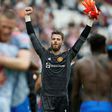 David de Gea celebrates after saving Mark Noble's penalty in Manchester United's 2-1 win against West Ham in the Premier League