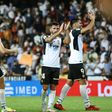 Winning start: Valencia's players celebrate