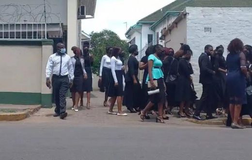 17 widows of dead rapist and polygamist clash with his family in court over inheritance