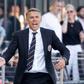 Phil Neville believes David Beckham's son Romeo has the attributes to forge a career in professional football