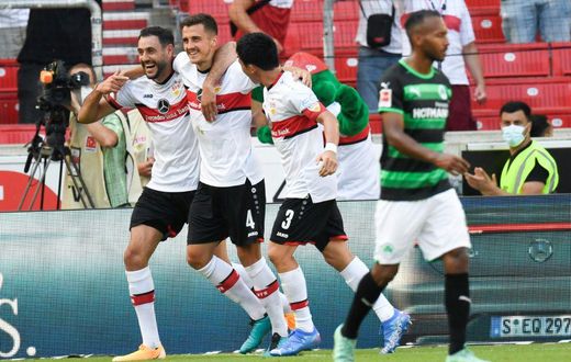 Stuttgart goalscorers (from left) Hamadi Al Ghaddioui, Marc-Oliver Kempf and Wataru Endo celebrate the 5-0 thrashing of Greuther Fuerth on Saturday