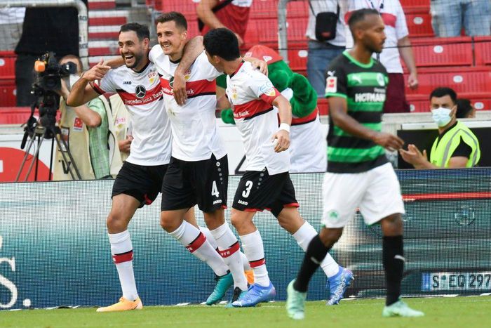 Stuttgart goalscorers (from left) Hamadi Al Ghaddioui, Marc-Oliver Kempf and Wataru Endo celebrate the 5-0 thrashing of Greuther Fuerth on Saturday