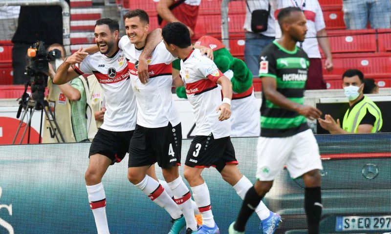 Stuttgart goalscorers (from left) Hamadi Al Ghaddioui, Marc-Oliver Kempf and Wataru Endo celebrate the 5-0 thrashing of Greuther Fuerth on Saturday