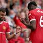 Deadly duo: Bruno Fernandes (left)scored a hat-trick and Paul Pogba (right)provided four assists in Manchester United's 5-1 win over Leeds