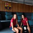 Barcelona's women's B team players Claudia Riumallo Pineda (L) and Laura Coronado pose after a training session at the La Masia Residence