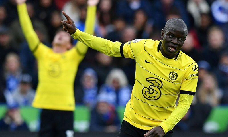 Chelsea midfielder N'Golo Kante (R) celebrates at Leicester