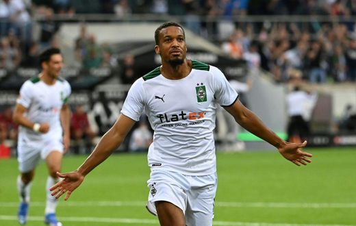 Moenchengladbach forward Alassane Plea celebrates scoring the opening goal on Friday against Bayern Munich