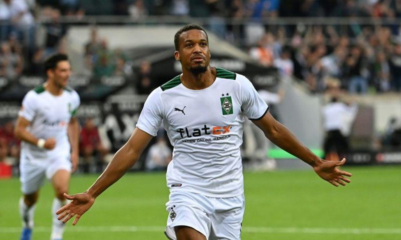 Moenchengladbach forward Alassane Plea celebrates scoring the opening goal on Friday against Bayern Munich