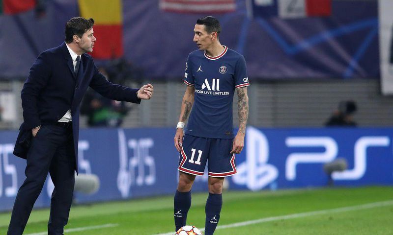 PSG coach Mauricio Pochettino with Angel di Maria during Wednesday's Champions League game against Leipzig
