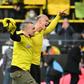 Dortmund's Norwegian forward Erling Braut Haaland celebrates with a fan after scoring twice against Mainz on Saturday