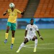 Match-winner Teboho Mokoena (L) of South Africa heads the ball watched by Marvelous Nakamba (R) of Zimbabwe during a World Cup qualifier in Johannesburg on Thursday.