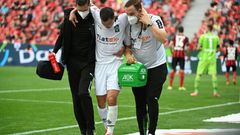 Moenchengladbach defender Stefan Lainer (C) suffered a broken leg in the defeat at Bayer Leverkusen
