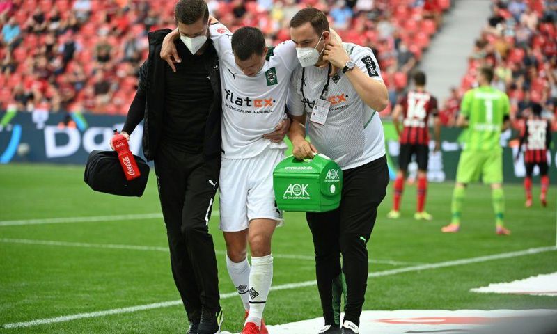 Moenchengladbach defender Stefan Lainer (C) suffered a broken leg in the defeat at Bayer Leverkusen