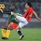 A file picture of now retired Cameroon star Geremi Njitap (L) playing against Egypt during he 2008 Africa Cup of Nations in Ghana
