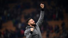 Reaching for the top: Olivier Giroud celebrating victory over Torino