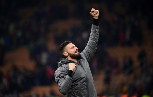 Reaching for the top: Olivier Giroud celebrating victory over Torino