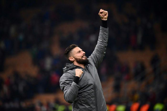 Reaching for the top: Olivier Giroud celebrating victory over Torino
