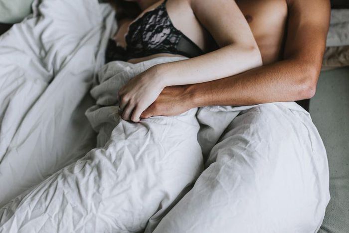 ___8967154___2018___10___11___17___cropped-view-of-couple-spooning-in-bed-royalty-free-image-680787089-1539191813