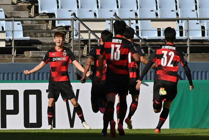 Pohang Steelers' Lee Seung-mo celebrates scoring against
Nagoya Grampus