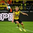 Erling Braut Haaland scored with a stunning lob in a two-goal haul for Dortmund on Sunday