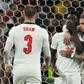 England's Bukayo Saka (C) was among those receiving racial abuse online