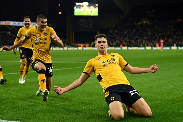 Wolves defender Max Kilman celebrates after scoring against Everton